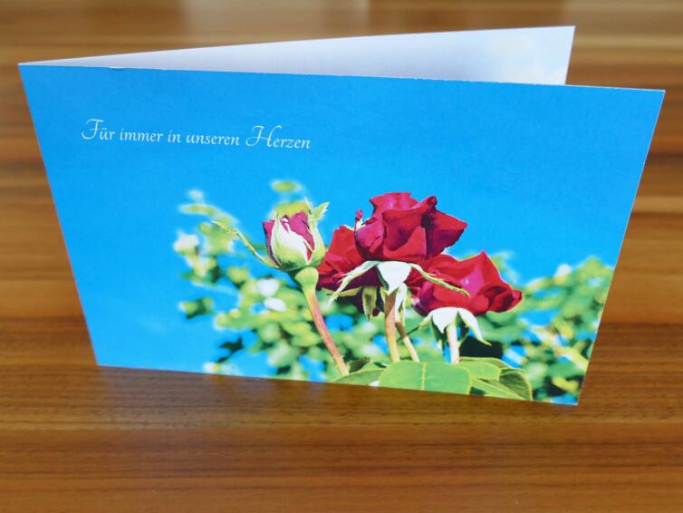 Danksagungskarte mit Rose und Spruch.